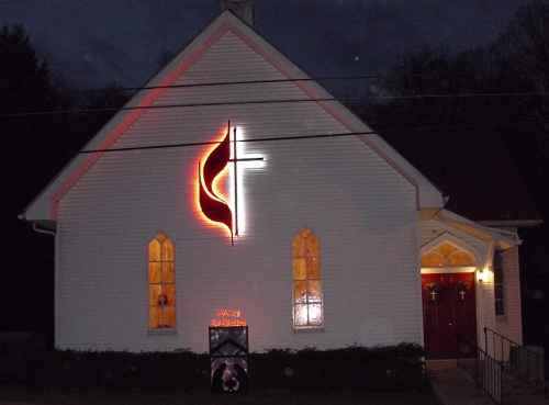 LED backlit UMC cross United methodist cross and flames 10 ft at night UMC cross and flames