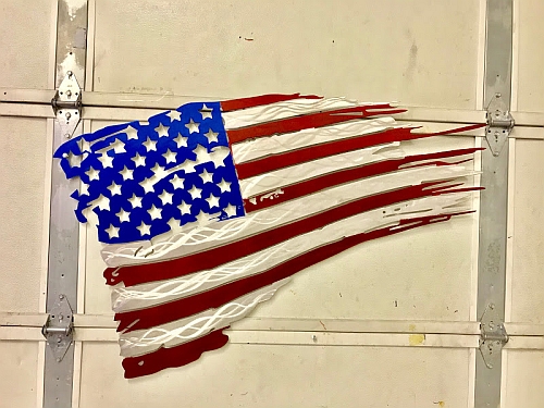 Tattered flag design in flag metal flag design