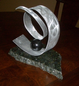  viscardi designs,sculpture in aluminum and tabletop sculpture for mantel