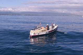 Tori Murden rowed her 23-foot boat, the American Pearl, into the harbor at Guadeloupe on Dec. 3, 1999, to end her 81-day, 3,333-mile voyage across the Atlantic Ocean.